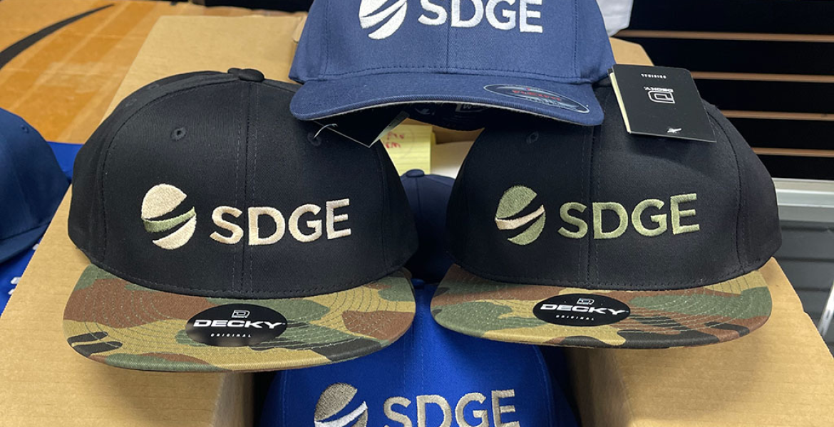 Custom professionally embroidered corporate logo hats for brand promotion and advertising